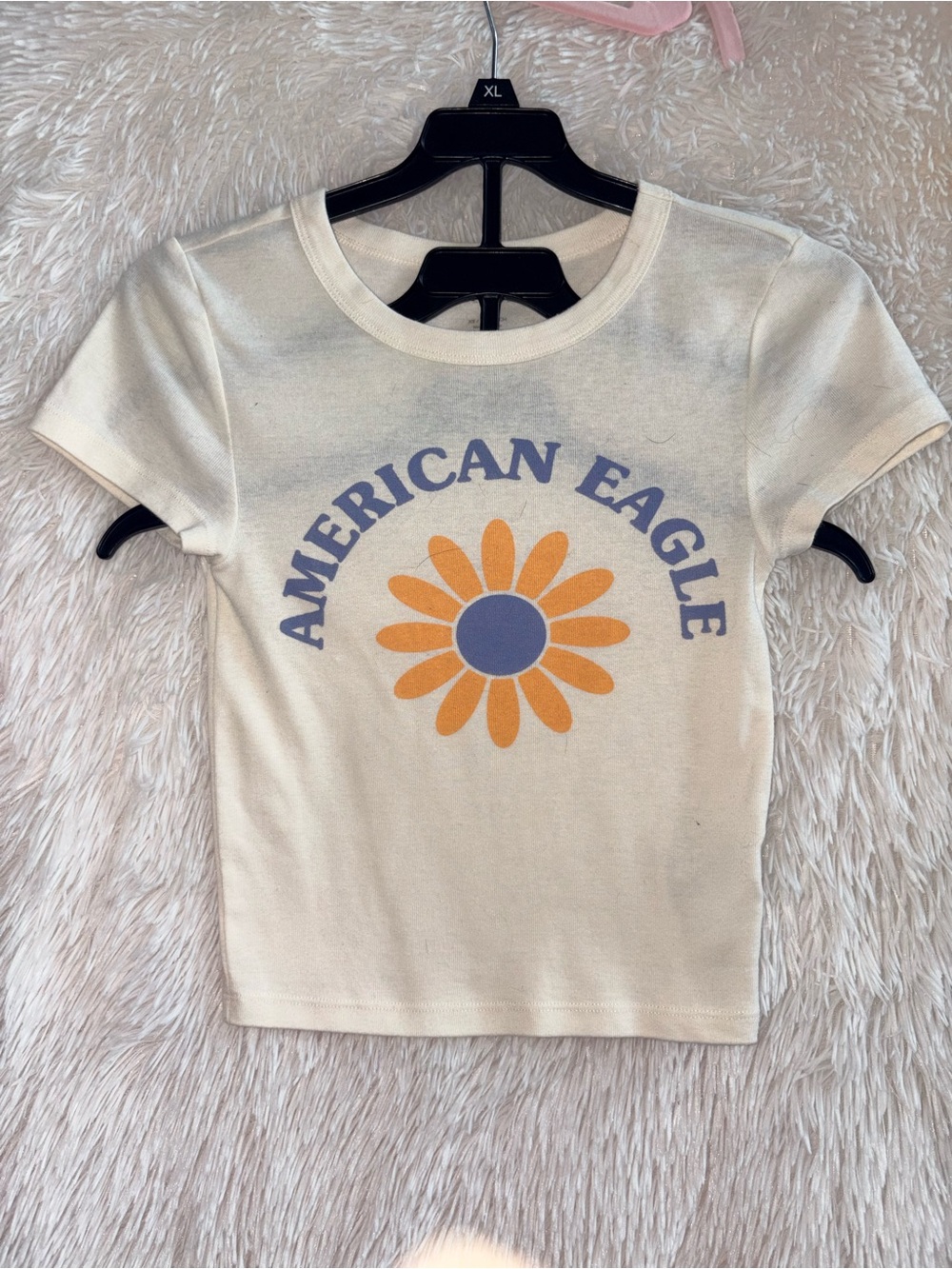 American Eagle Outfitters Cream Tee with Orange Daisy and Blue Logo